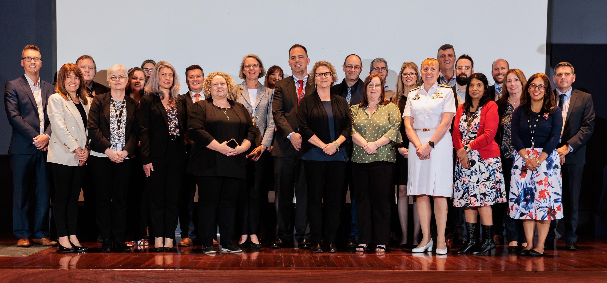 Photograph of the 2022 Commonwealth Procurement Awards for Excellence award recipients with the Finance Secretary