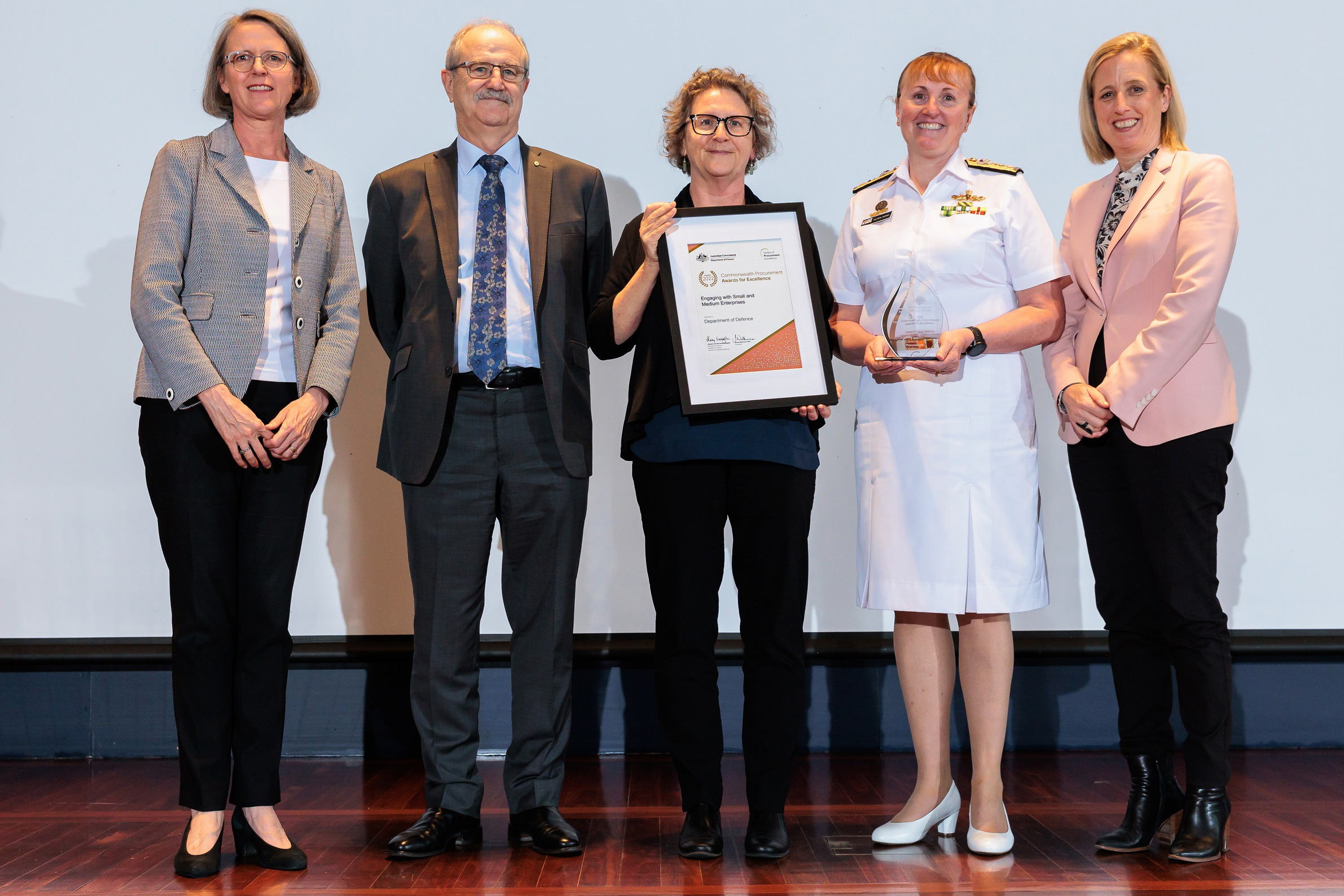 Photograph of the Engaging with SMEs Gold award recipients – Department of Defence with the Minister for Finance and the Finance Secretary