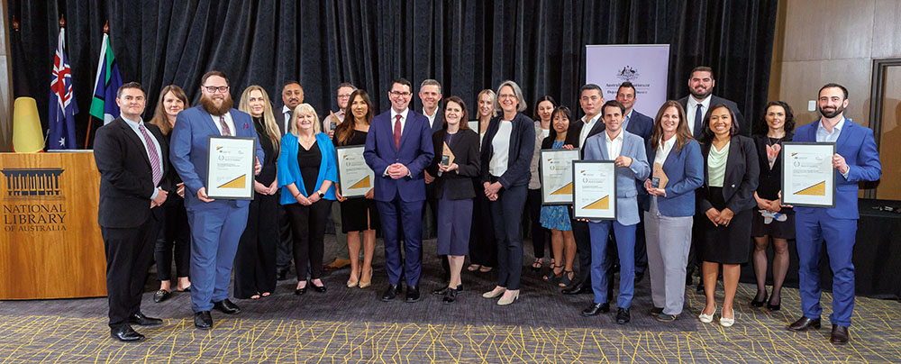 Photograph of the 2023 Commonwealth Procurement and Contract Management Awards for Excellence award recipients with the Assistant Minister to the Prime Minister, Assistant Minister for the Public Service and Finance Secretary